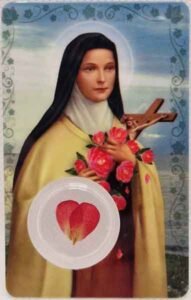Estampa de Santa Teresa de Lisieux con medalla