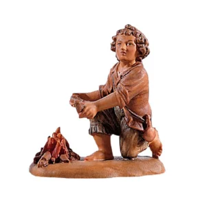 Child kneeling near fireplace (Highlander Nativity)