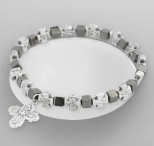 Brazalete con Cruz. Elástico